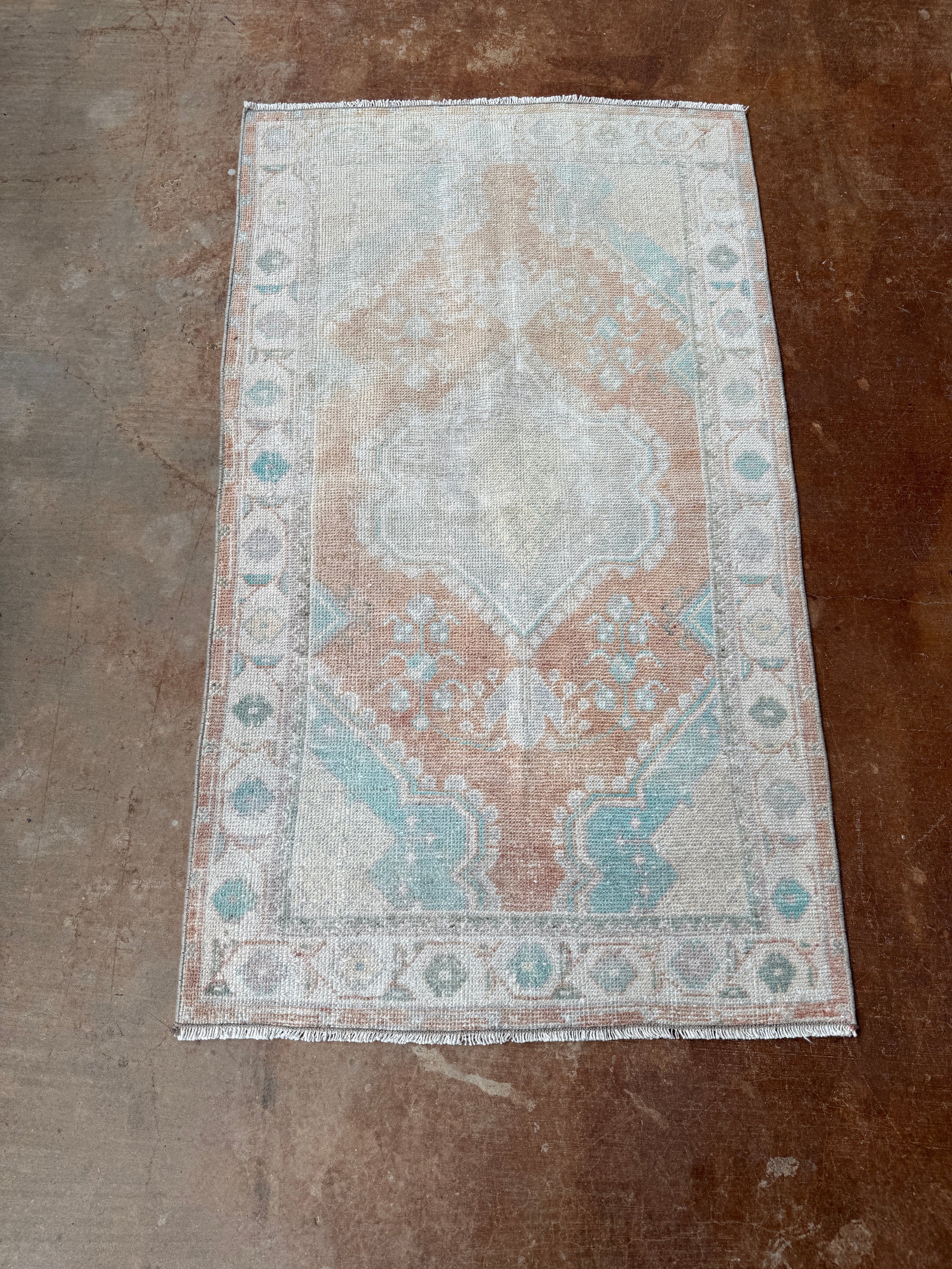 vintage Turkish rug, 4x6 rug, small accent rug, faded terracotta rug, aqua medallion rug, handwoven Turkish rug, boho rug, layered rug look, one of a kind rug, vintage home decor, entryway rug, kitchen runner, neutral Turkish rug