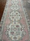 vintage Turkish rug, rose runner rug, sage pink runner, Turkish hallway rug, floral medallion rug, narrow area rug, handmade vintage runner, bohemian runner rug, soft faded runner, traditional Turkish decor