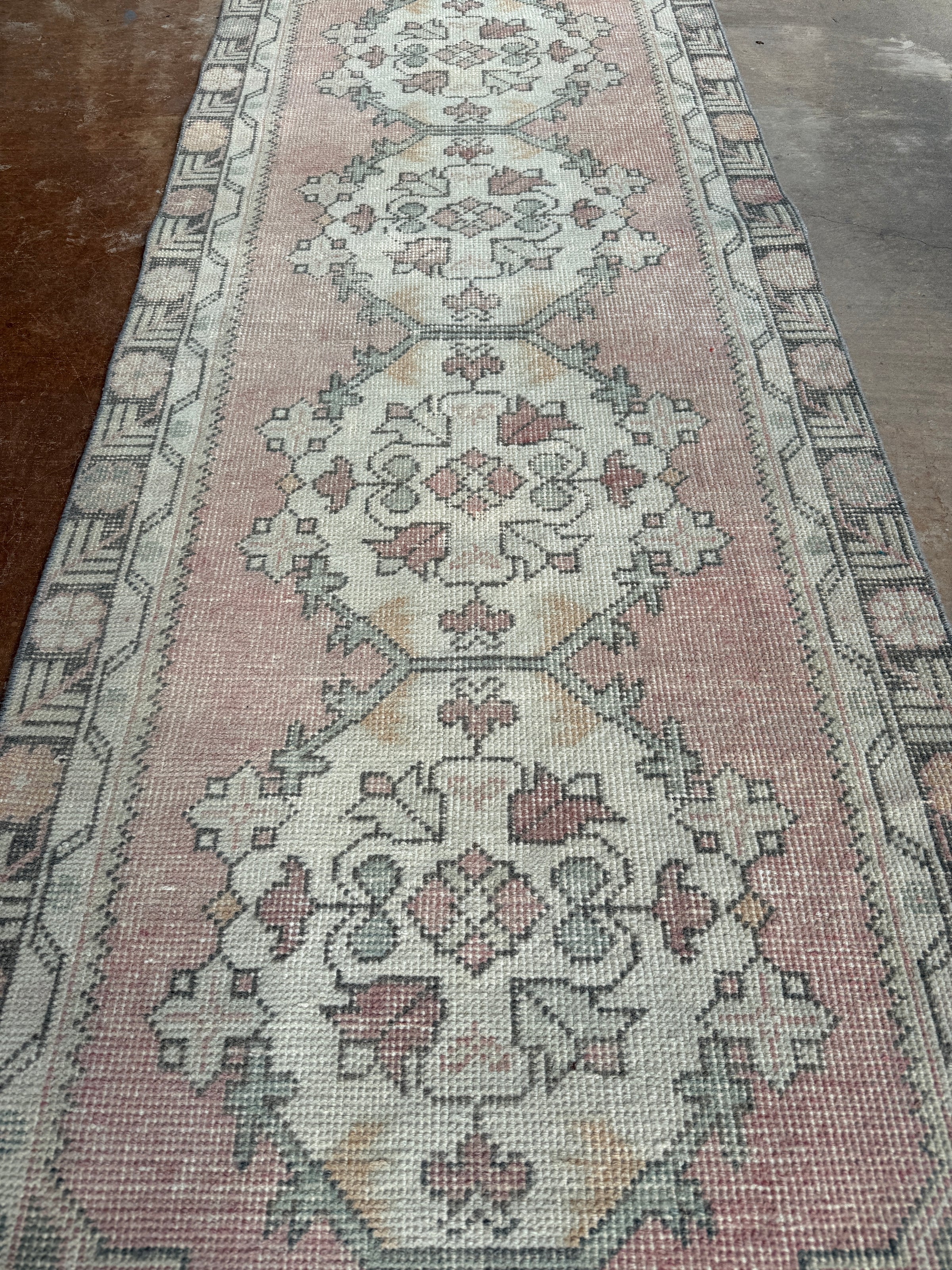vintage Turkish rug, rose runner rug, sage pink runner, Turkish hallway rug, floral medallion rug, narrow area rug, handmade vintage runner, bohemian runner rug, soft faded runner, traditional Turkish decor