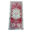 Decorative rug with intricate patterns on a white background