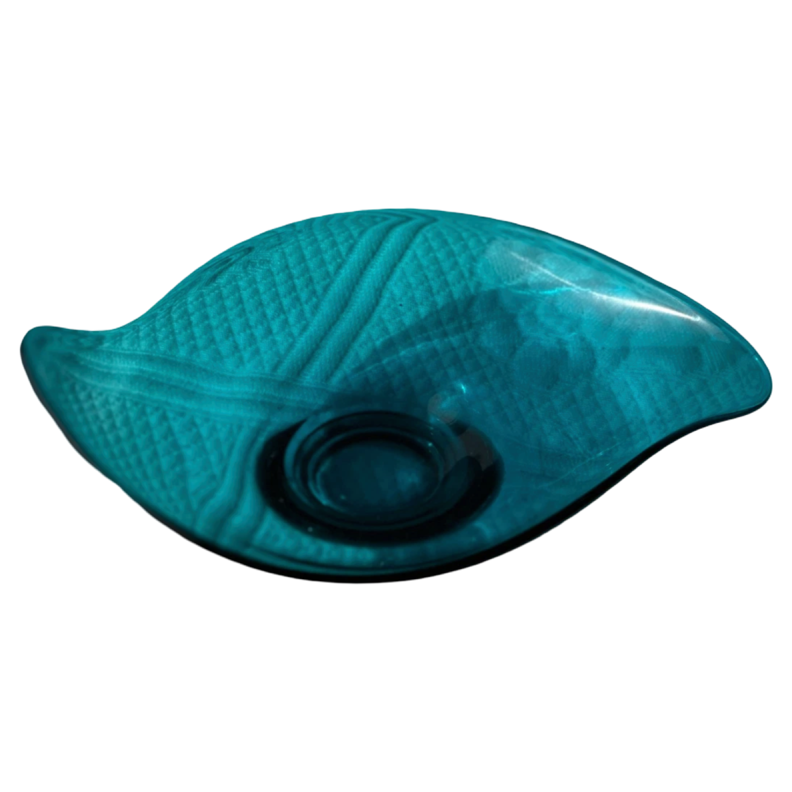 Teal glass bowl with textured surface on a white background