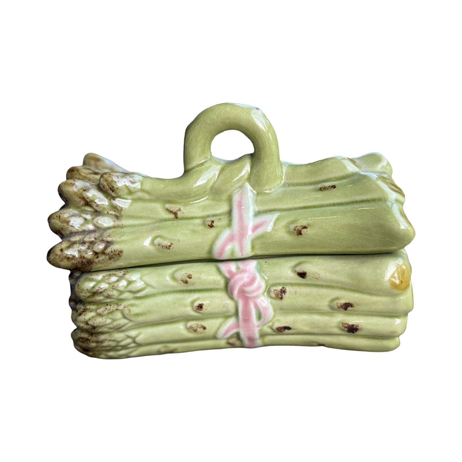 Ceramic asparagus salt and pepper shaker set on a white background