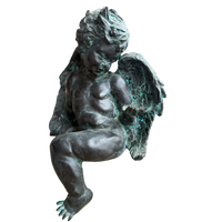Bronze statue of a winged child on a white background