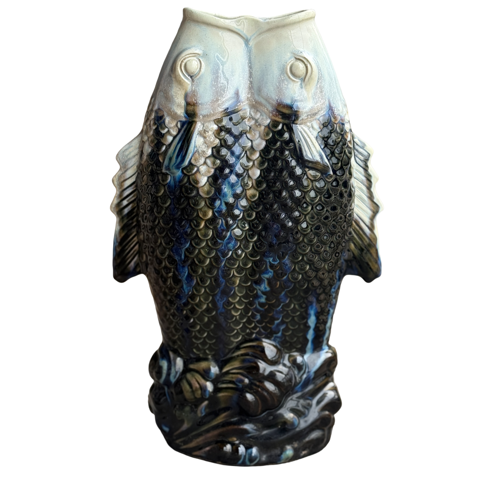 Decorative vase shaped like two fish on a white background
