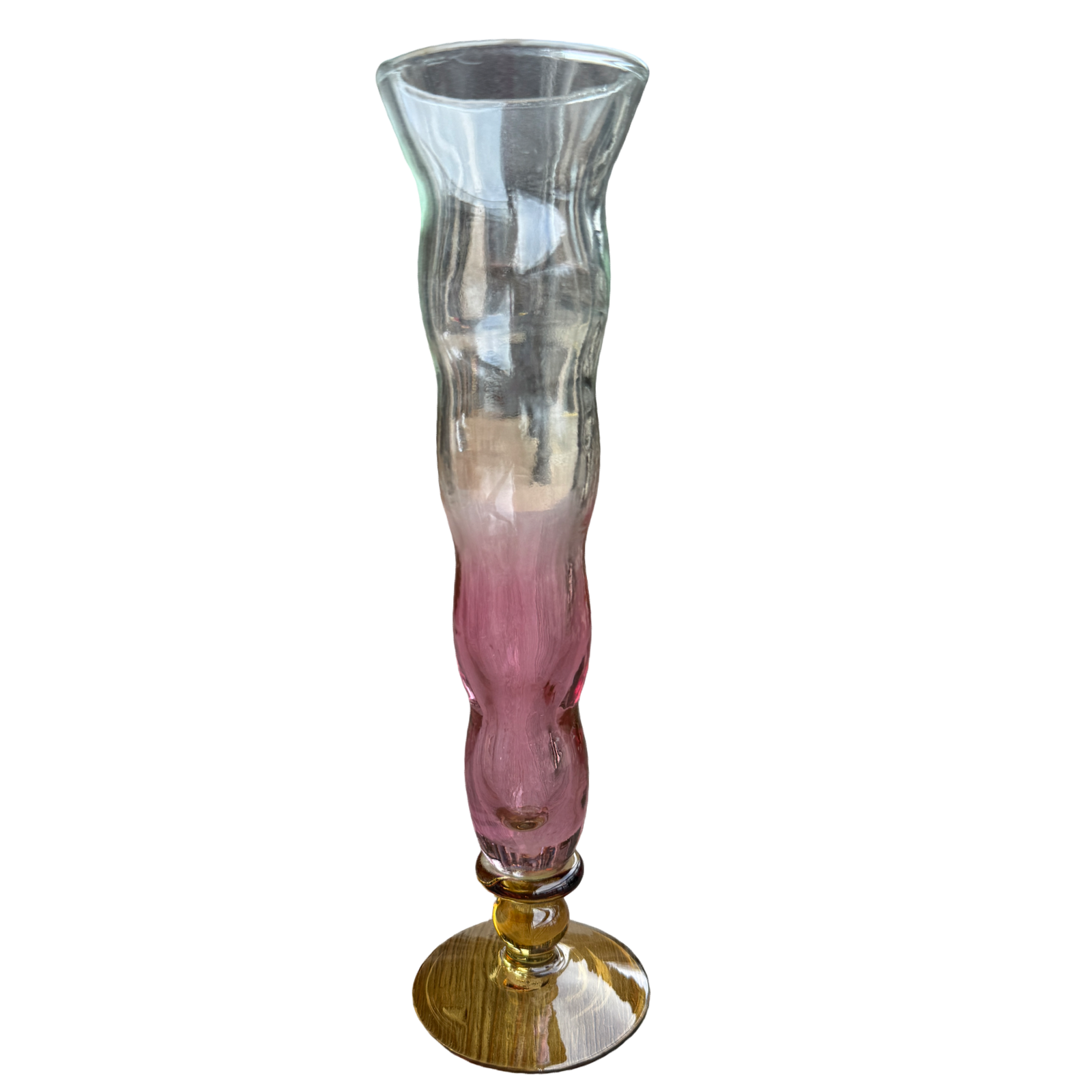 Glass vase with pink and gold base on a white background