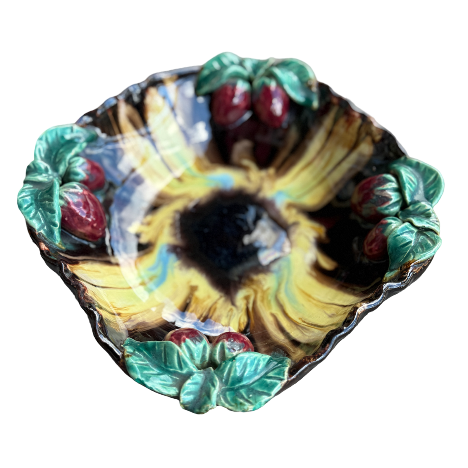 Decorative ceramic bowl with sunflower and berry design on a white background