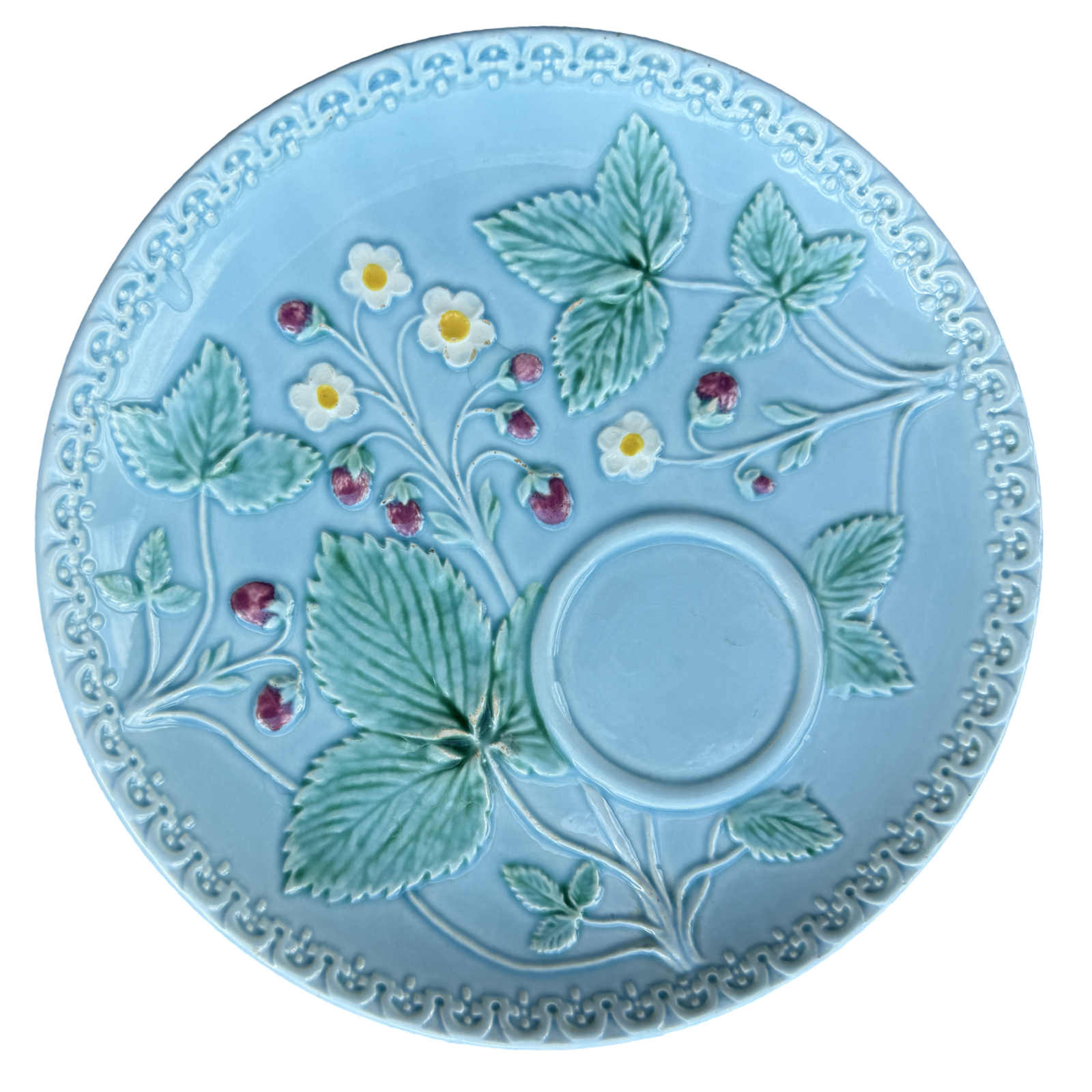 Decorative plate with strawberry design on a light blue background