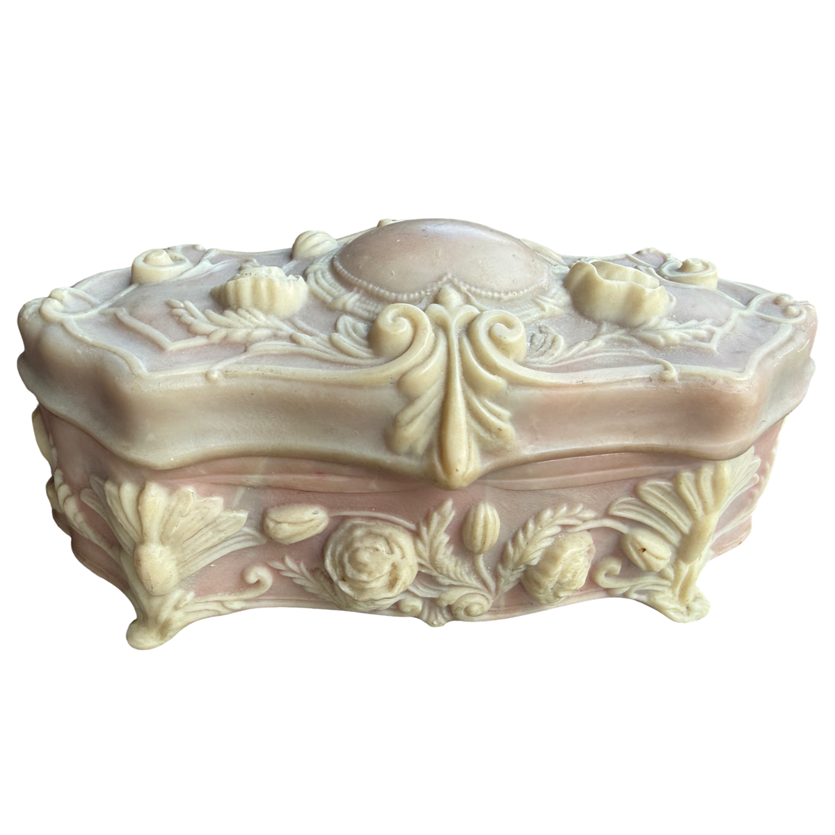 Decorative cream-colored jewelry box with intricate designs on a white background