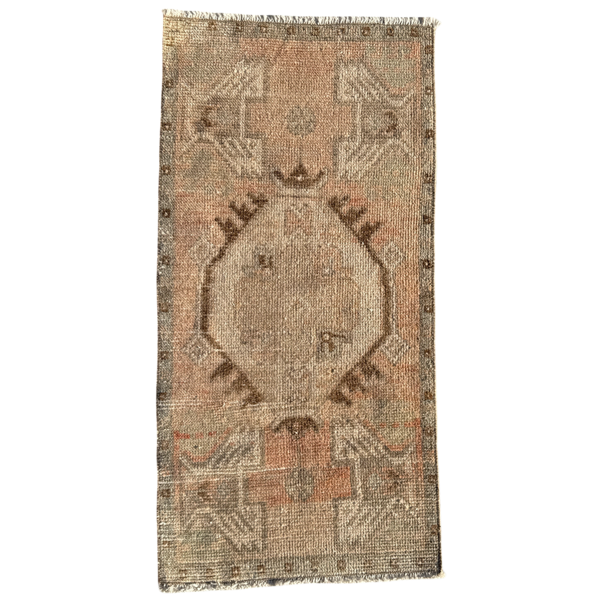 Rectangular vintage-style rug with intricate patterns on a white background