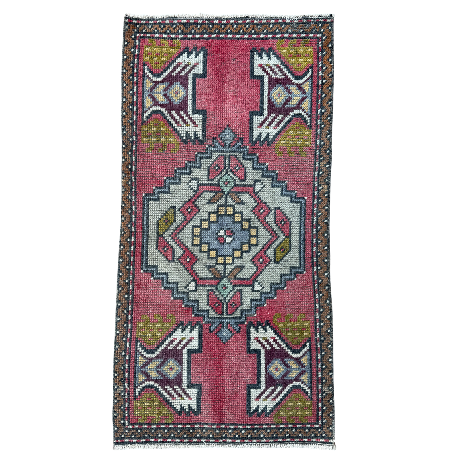 Decorative rug with geometric pattern on a white background