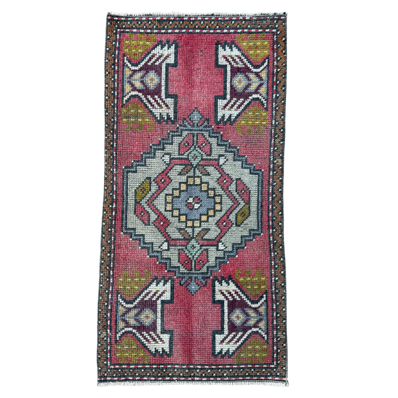 Decorative rug with geometric pattern on a white background