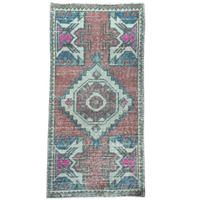 Decorative rug with geometric pattern on a white background