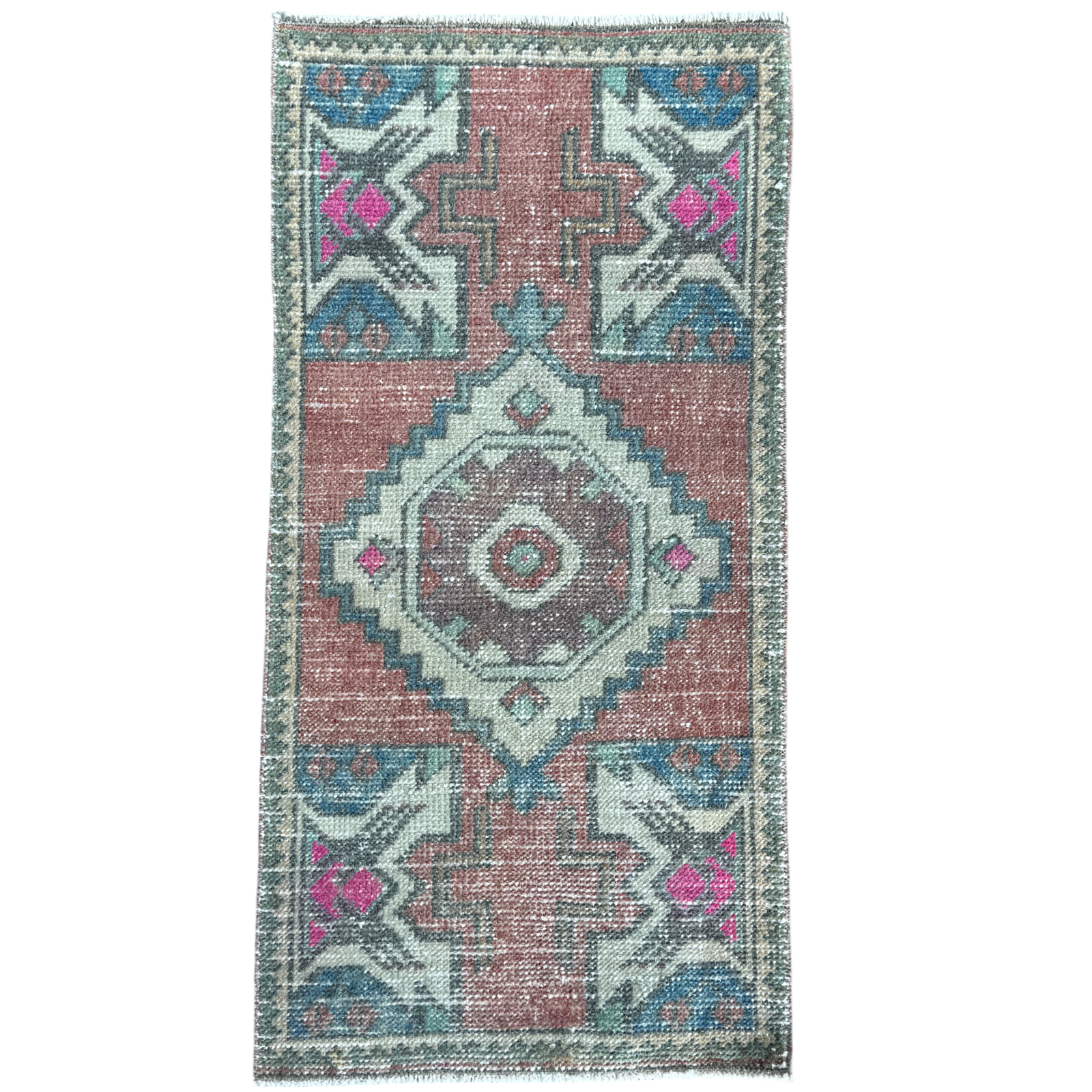 Decorative rug with geometric pattern on a white background