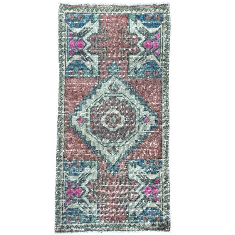 Decorative rug with geometric pattern on a white background