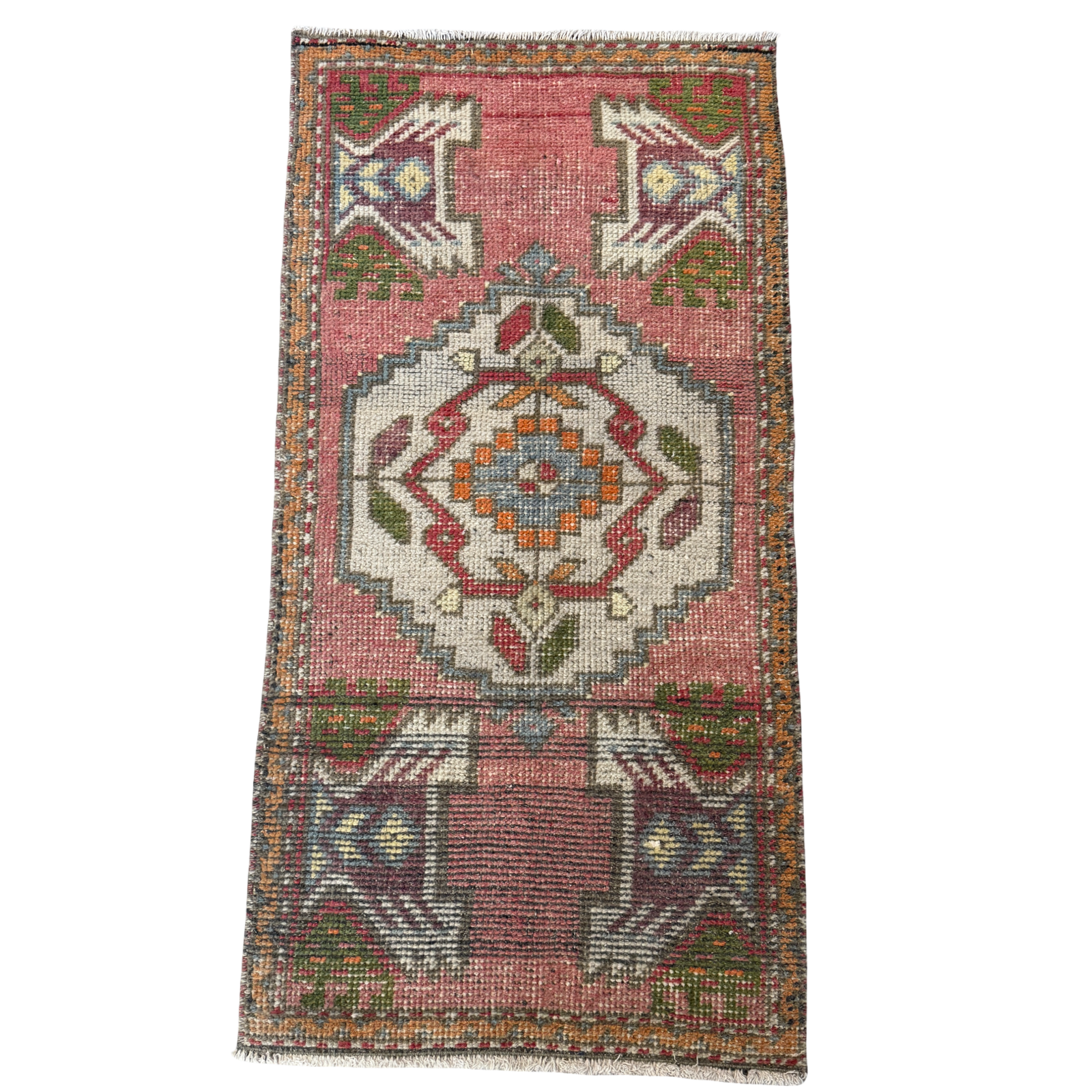 Decorative rug with geometric pattern on a white background
