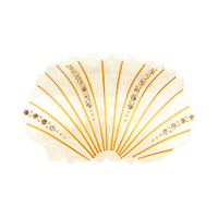White acetate shell-shaped claw clip decorated with sparkling rhinestones.