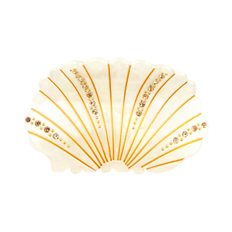 White acetate shell-shaped claw clip decorated with sparkling rhinestones.