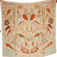 Decorative fabric with horse and floral pattern on a light pink background